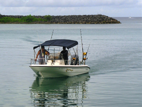 This is an image of a fishing boat and fishermen.